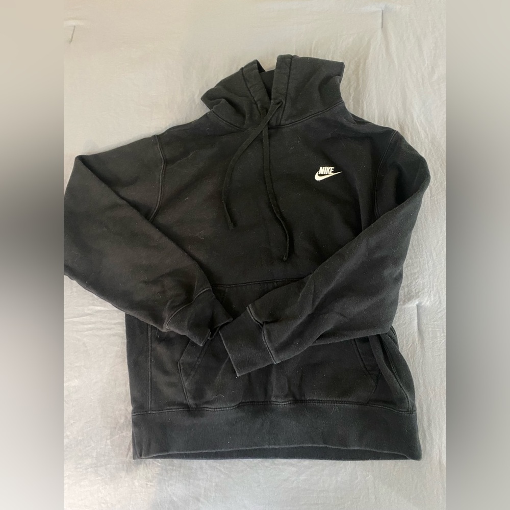 Nike black hoodie w/ embroidered logo detail, size small.